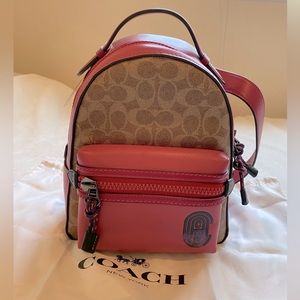 New with tags pretty pink coach backpack🌸